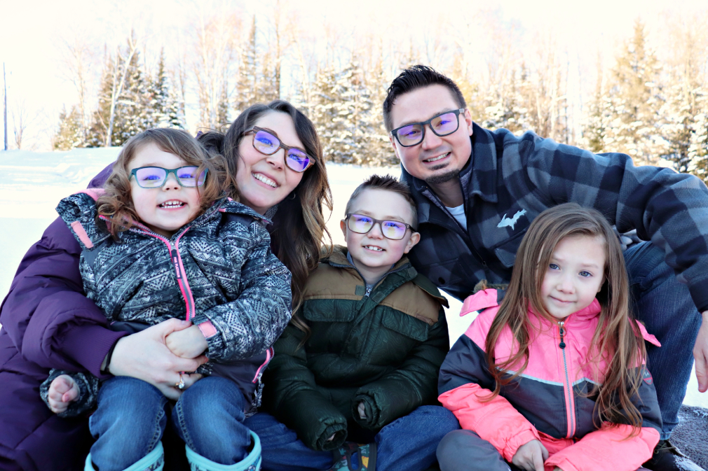 The doctors and their kids at a park